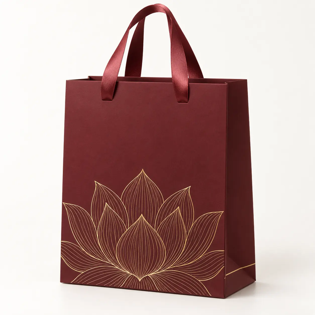 Maroon Lotus Gold Luxury Bag — premium printed paper carry bag with satin ribbon handles